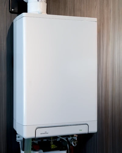 Intergas cv-ketel die an de muur hangt